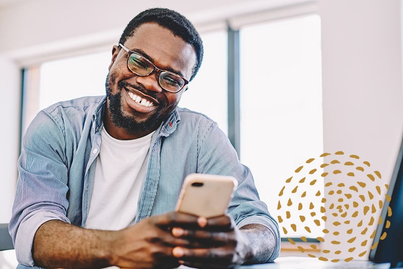 man checking dermatology pricing on phone