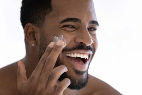 Man Applying Face Cream